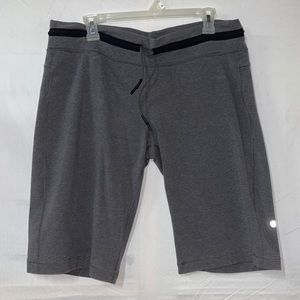 Great Used Condition Lululemon gray and black sweat shorts. Size 12. 
LL32